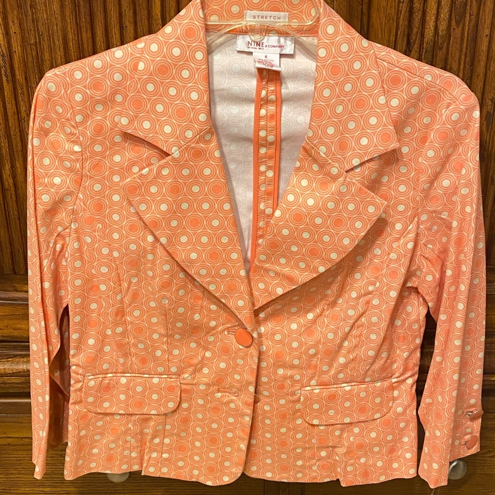 Nine and Company, ladies jacket, size 6, peach or orange color new with tags